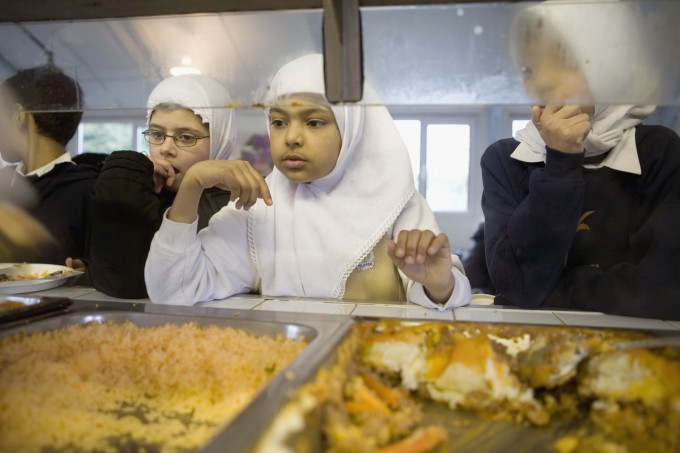 Muslim Schoolchildren Waiting in Cafeteria